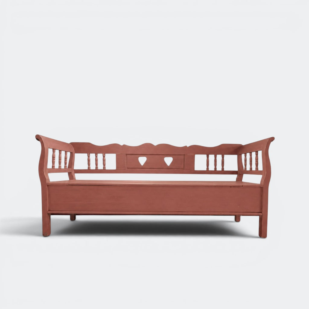 Two-metre handmade Dutch settle bench with hidden storage in distressed green solid pine, spindle sides and heart cut-outs, This Country Home Surrey