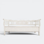 Two-metre handmade Dutch settle bench with hidden storage in distressed white solid pine, spindle sides and heart cut-outs, This Country Home Surrey